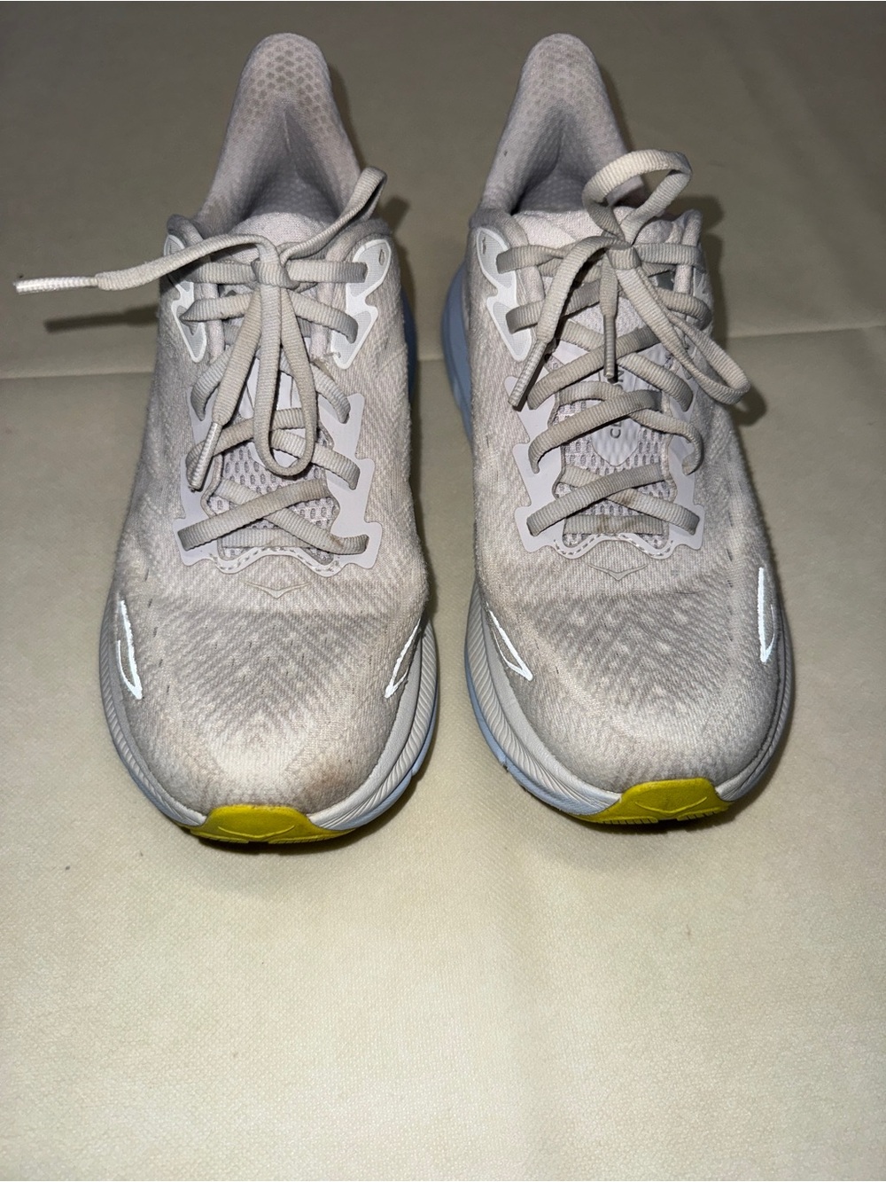 Hoka Women's Light Gray Running Shoes with Yellow Toe Accents